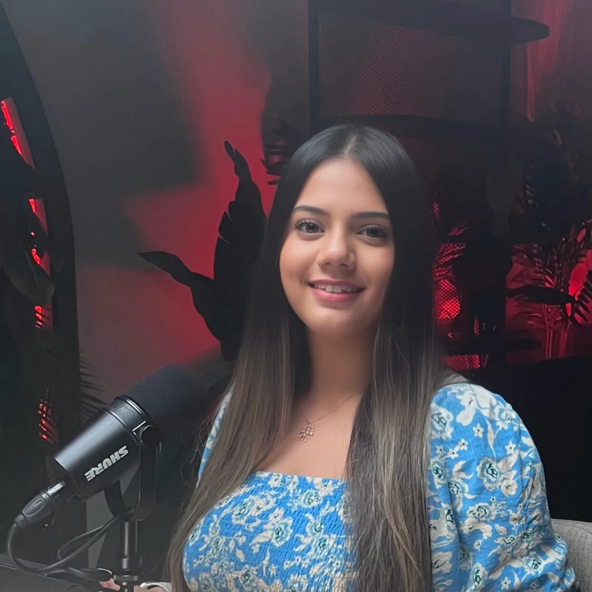 Ambreen on a podcast