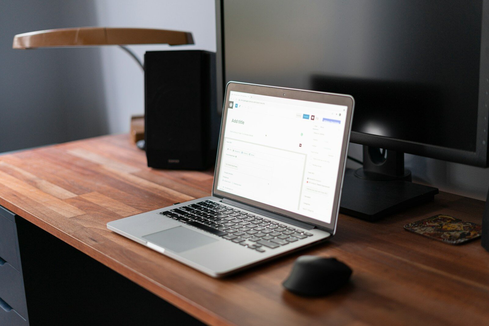 Laptop on a desk showing an automated marketing workflow dashboard