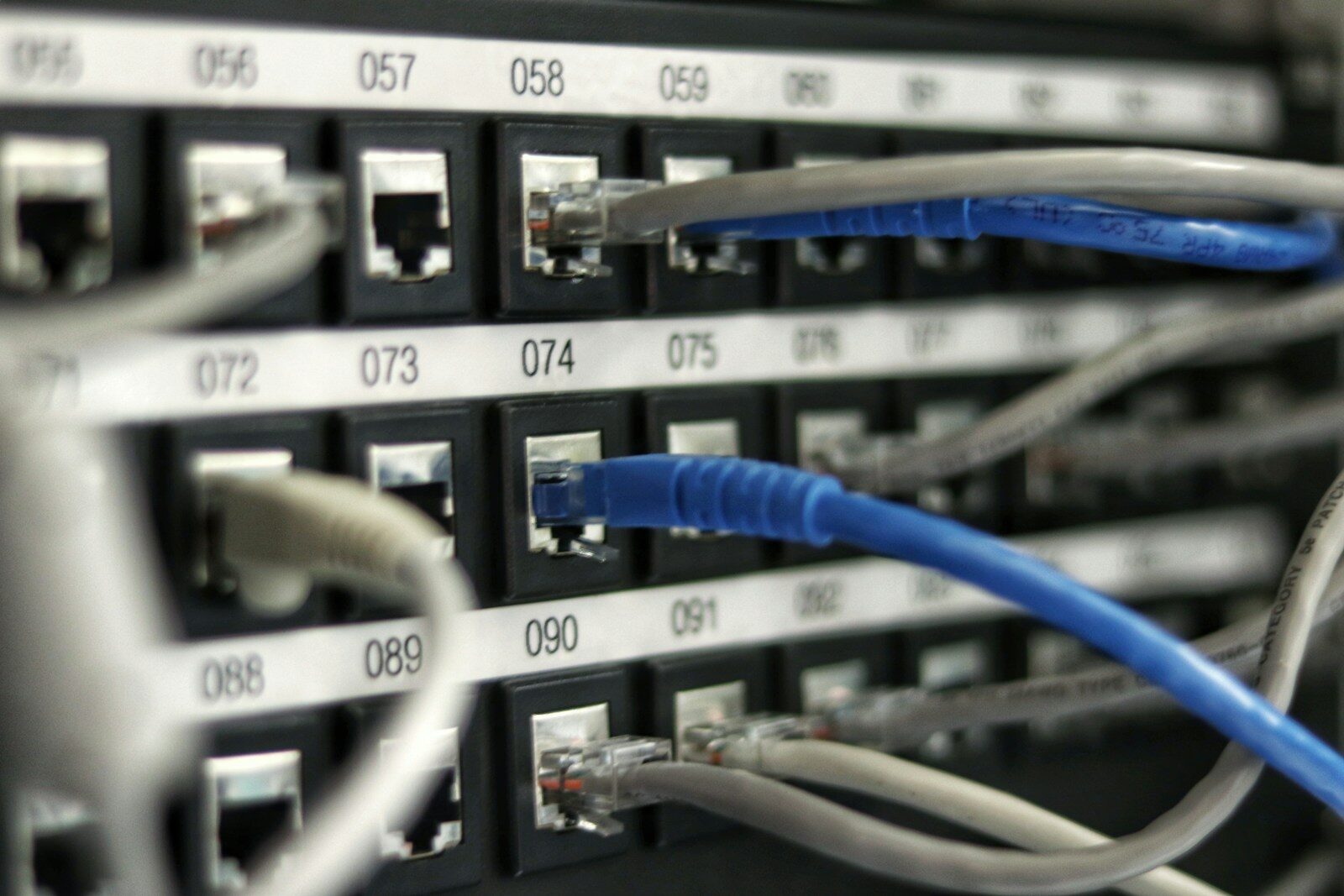 Server racks lit in blue, representing the Meta Andromeda algorithm retrieval system that decides which ads get shown