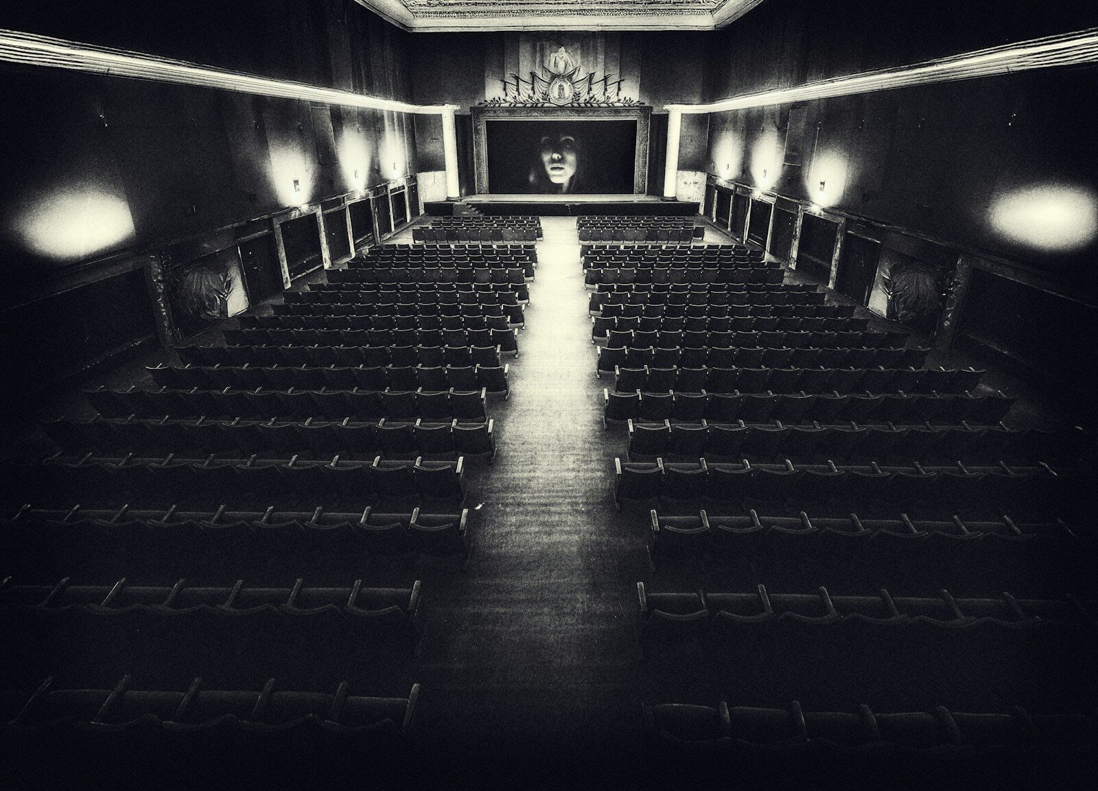 Rows of empty theatre seats, an image of the drop in attention that meta ads creative fatigue causes